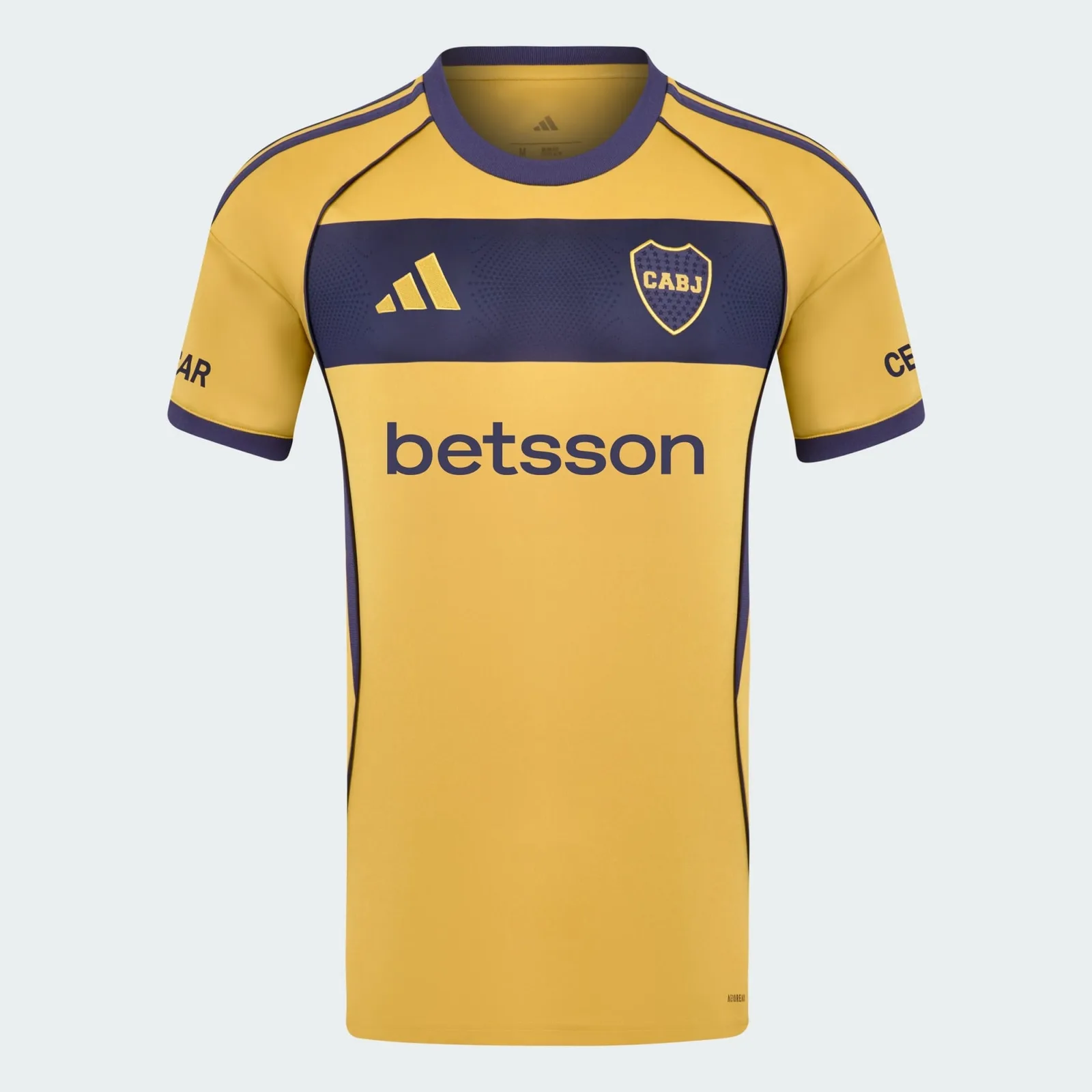 Boca Juniors uitshirt 2025/26 in lichtgoud met donkerblauwe details — toont het gelekte uitontwerp